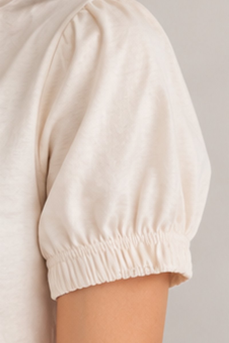 Beige ruffle hem dress